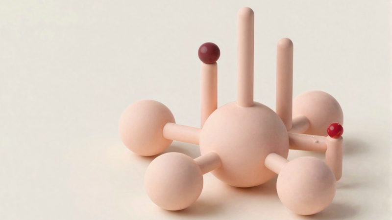 Illustration of a central hub connected by pipes to smaller spheres